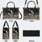 Skeleton Reading A Book Among Flowers - Leather Handbag