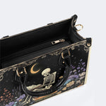 Skeleton Reading A Book Among Flowers - Leather Handbag