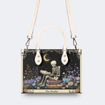 Skeleton Reading A Book Among Flowers - Leather Handbag