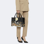 Skeleton Reading A Book Among Flowers - Leather Handbag