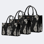 Hand Holding Cross Print Handbag Factory Direct Sales