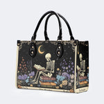 Skeleton Reading A Book Among Flowers - Leather Handbag