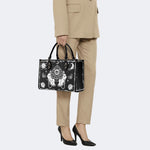 Poker Eyes And Moth Print - Leather Handbag