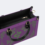 Inscribed Viper Print - Leather Handbag