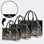 Skeleton Reading A Book Among Flowers - Leather Handbag
