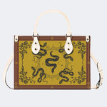 Inscribed Viper Print - Leather Handbag