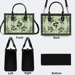 Inscribed Viper Print - Leather Handbag