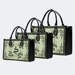 Inscribed Viper Print - Leather Handbag
