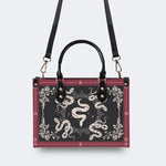 Inscribed Viper Print - Leather Handbag
