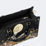 Skeleton Reading A Book Among Flowers - Leather Handbag