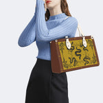 Inscribed Viper Print - Leather Handbag