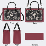 Inscribed Viper Print - Leather Handbag