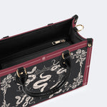 Inscribed Viper Print - Leather Handbag