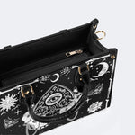 Poker Eyes And Moth Print - Leather Handbag